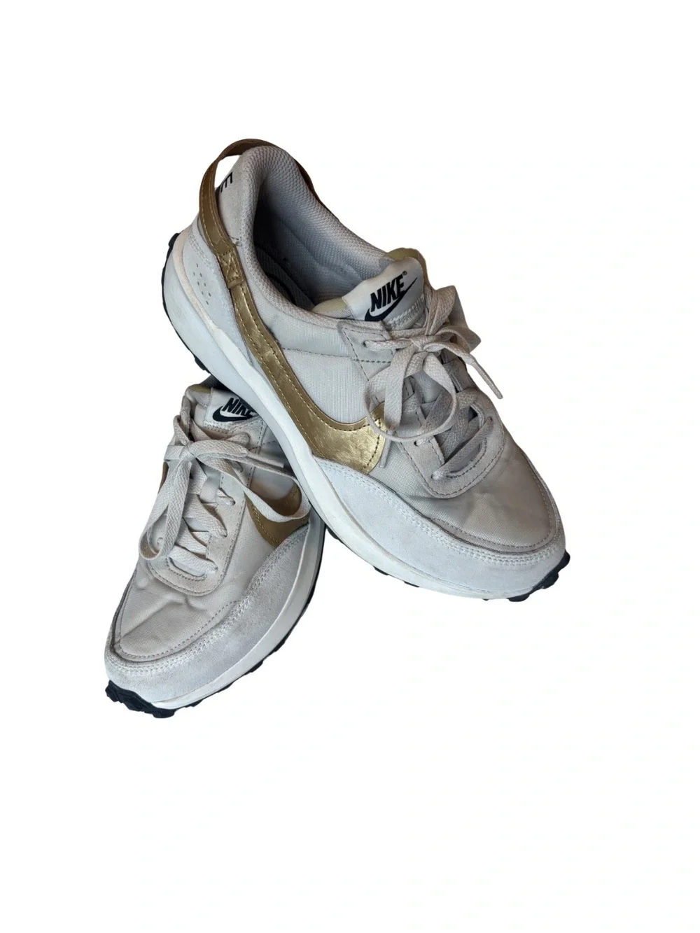 Nike Waffle Debut sneakers in a light orewood brown and metallic gold colorway